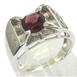 9ct white gold garnet set ring, size N, 6.2g. P&P Group 1 (£14+VAT for the first lot and £1+VAT