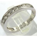 Hallmarked 18ct white gold and 1ct diamond half eternity ring, size P, 4.9g. P&P Group 1 (£14+VAT