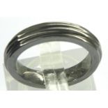 Hallmarked sterling silver Theo Fennell band ring with black oxidised finish, size K, 4.9g. P&P