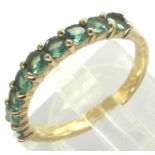 9ct gold alexandrite half eternity ring, size N/O, 2.0g. P&P Group 1 (£14+VAT for the first lot