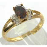 9ct gold Lightning Ridge black opal and white topaz ring, size N, 2.4g. P&P Group 1 (£14+VAT for the