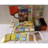 Large collection of Pokémon cards, loose ones and also two folders containing cards. P&P Group 1 (£