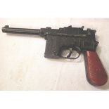 Lone Star Man From Uncle gun, 7.63mm automatic, cap firing. In very good condition, some paint loss,