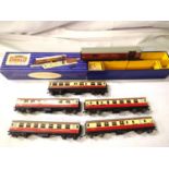 Five Hornby Dublo three rail tinplate coaches, Crimson and Cream. In good to very good condition,