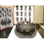 Set of 12 cast resin Knights of the Realm figures with round table, in excellent condition, boxed.