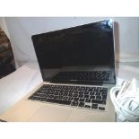 Apple Macbook pro laptop computer, circa 2010, does not boot but powers on, with charger. P&P