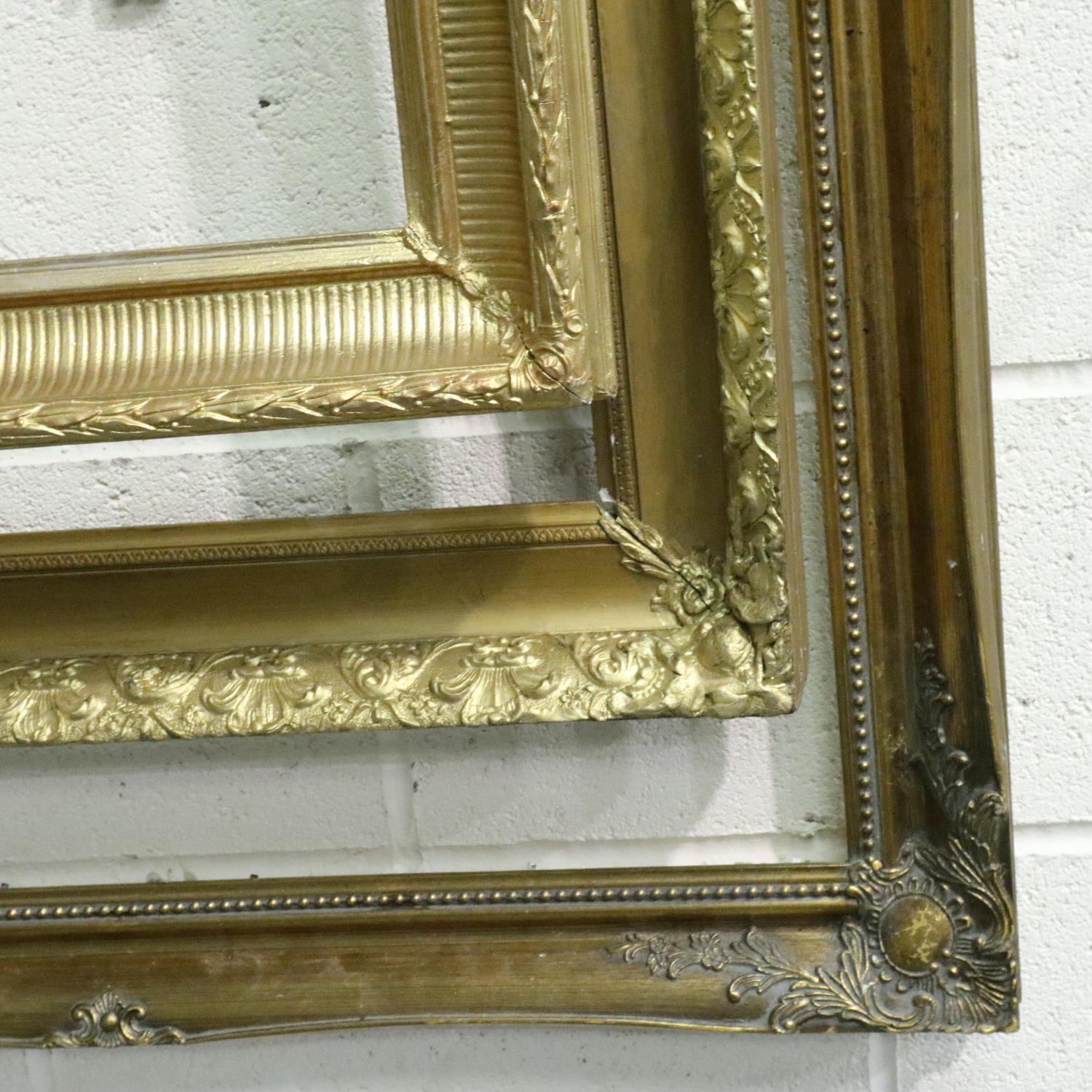 Two 19th century plaster gilt frames and a larger later gilt frame, interior sizes, 66 x 46, 81 x 56 - Image 2 of 2