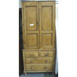 19th century stripped pine two long over two short chest of drawers with upper two door two shelf