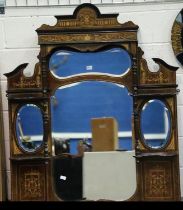 A large 19th century rosewood over mantel mirror, inlaid and with four shaped panels of glass,