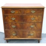 An Edwardian inlaid walnut chest of two short above three long drawers. Not available for in-house