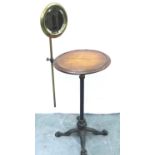 An Edwardian gentlemans wash stand, having an adjustable brass shaving mirror, circular oak stand