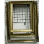 Two 19th century plaster gilt frames and a larger later gilt frame, interior sizes, 66 x 46, 81 x 56