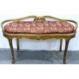 A 20th century gilt wood window seat with bergere and loose upholstered seat pad, 106 x 45 x 62 cm