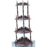 A reproduction mahogany etagere, H: 143 cm. Not available for in-house P&P, contact Paul O'Hea at