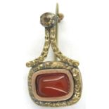 Georgian 1811, gold cased Carnelian brooch of Halleys Comet form, 1.5g. P&P Group 1 (£14+VAT for the