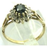 9ct gold daisy set ring with a central sapphire and diamonds, size I, 1.5g. P&P Group 1 (£14+VAT for