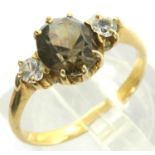 Yellow metal topaz and clear stone set ring, size N/O, 2.6g. P&P Group 1 (£14+VAT for the first