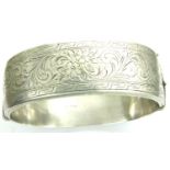 Hallmarked silver wide bangle, D: 55 mm, with safety chain, fully functional, 46g. P&P Group 1 (£