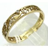 9ct gold diamond set filigree ring, size V, 1.9g. P&P Group 1 (£14+VAT for the first lot and £1+