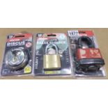 New and unused Dekton 65 mm waterproof padlock, 70 mm discus padlock and a 50 mm brass padlock. P&