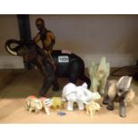 Nine Elephant figurines and an Elephant pin badge (10). Not available for in-house P&P, contact Paul