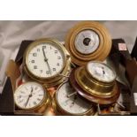 Tray of Marine style brass effect clocks and barometers, working at lotting. Not available for in-