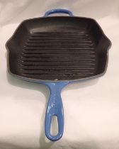 Blue Le Creuset grill pan. Not available for in-house P&P, contact Paul O'Hea at Mailboxes on