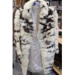 Ladies size 12 fur coat in white. Not available for in-house P&P, contact Paul O'Hea at Mailboxes on