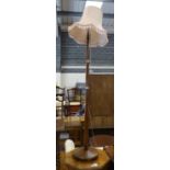 Wooden turned standard lamp, H: 200 cm. All electrical items in this lot have been PAT tested for