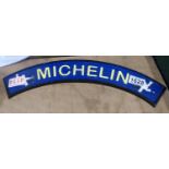 Cast iron curved Michelin Man sign, L: 30 cm. P&P Group 1 (£14+VAT for the first lot and £1+VAT