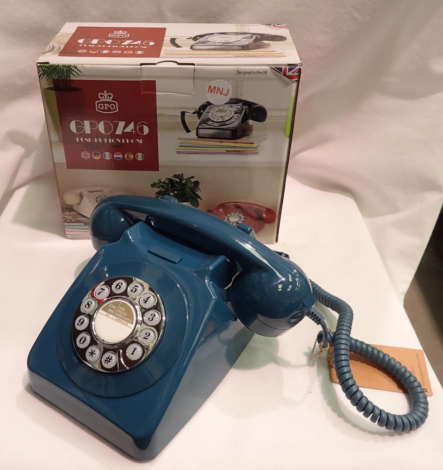 Azure blue 1960/1970s style push button telephone, compatible with modern telephone banking and