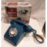 Azure blue 1960/1970s style push button telephone, compatible with modern telephone banking and