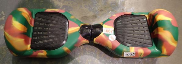 Hoverboard with colourful rubber overcover. Not available for in-house P&P, contact Paul O'Hea at