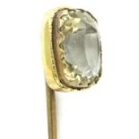 Antique yellow metal quartz/topaz stick pin, unmarked, 3.3g. P&P Group 1 (£14+VAT for the first