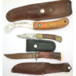 William Rogers of Sheffield leather sheathed hunting knife, a life raft survival knife and a further