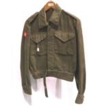 Scottish WWII battle dress dated 1945, size 13, significant hole in the back. P&P Group 2 (£18+VAT