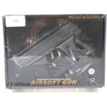 New boxed 6mm airsoft pistol, model V7, in tan. P&P Group 2 (£18+VAT for the first lot and £3+VAT