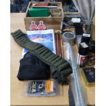 Collection of gun cleaning items and accessories to include gun matt and shotgun cartridge belt. P&P