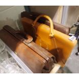 Three vintage leather suitcases. Not available for in-house P&P