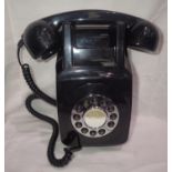 Black rotary style wall telephone. P&P Group 1 (£14+VAT for the first lot and £1+VAT for