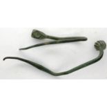 Dark Ages, two ornate bronze hair pins manipulated to shape, largest L: 55 mm. P&P Group 0 (£5+VAT