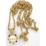 14ct gold pendant necklace, set with a central pearl, surround set with diamonds and rubies, L: 10