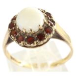 9ct gold opal and garnet set ring, size O/P, 2.1g. P&P Group 1 (£14+VAT for the first lot and £1+VAT