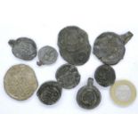 Nine workhouse Medieval lead seals, largest 35 mm. P&P Group 0 (£5+VAT for the first lot and £1+