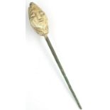 Bronze Age Eastern hair pin with religious deity, L: 120 mm. P&P Group 0 (£5+VAT for the first lot