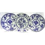 Two Mintons dinner plates in the Delft pattern and a Wedgwood Etruria shallow bowl in the Onion