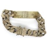 Hallmarked silver bark effect ID bracelet, L: 20 cm, London assay, 66g. P&P Group 1 (£14+VAT for the