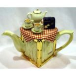 Tesco gold ceramic teapot, H: 21 cm. P&P Group 2 (£18+VAT for the first lot and £3+VAT for