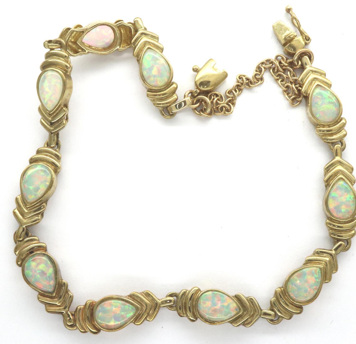 9ct gold opal set bracelet, L: 16 cm, 10.8g. P&P Group 1 (£14+VAT for the first lot and £1+VAT for