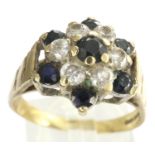 9ct gold flower ring set with sapphires and CZ, size R, 3.6g. P&P Group 1 (£14+VAT for the first lot